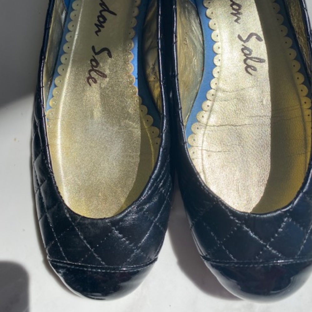 London Sole Black Cap Toe Flats.  Size 38.5 Euro or 7.5 US.